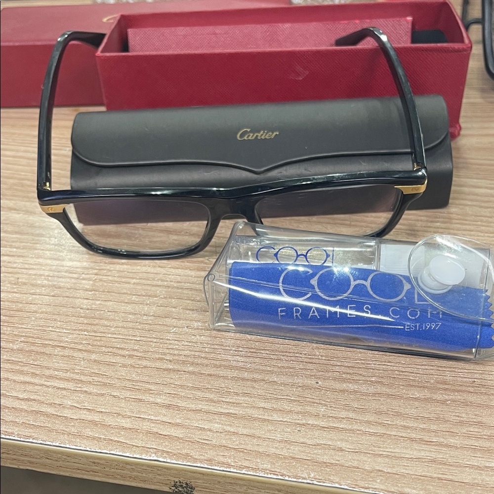 Cartier Black and Gold Frame Glasses